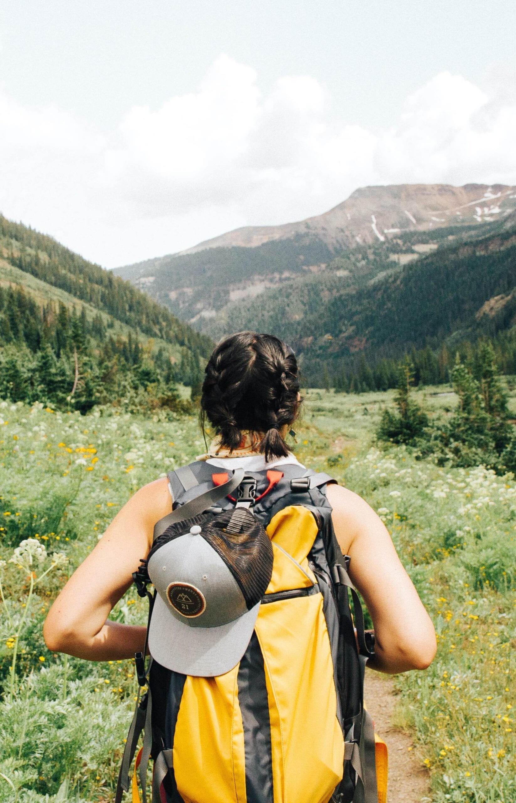 search for change lady hiking with a backpack